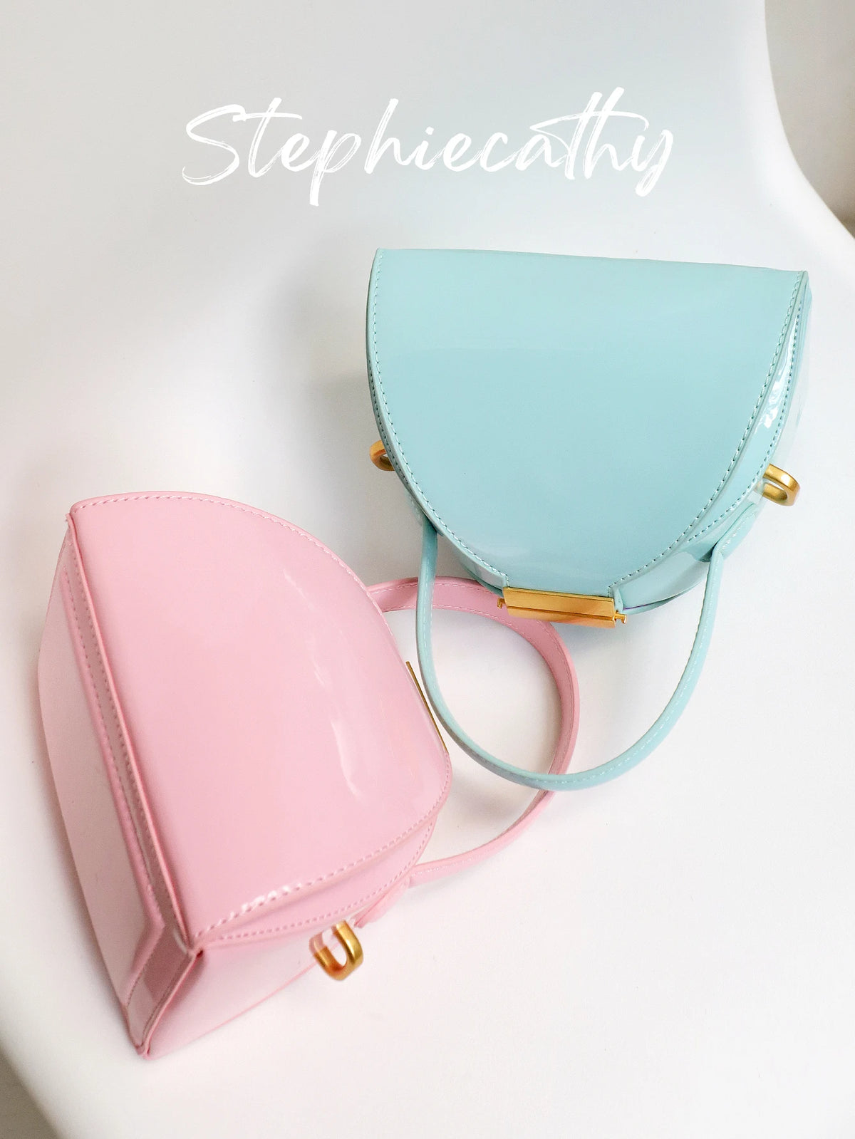 Curved Lock Crossbody Bag